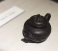 Ancient purple clay teapot