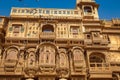 Ancient Rajasthan heritage building exterior with intricate artwork and architectural details known as the Patwon ki haveli