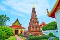 The ancient Suwanna Chedi and Viharn Phra Chao Daeng in Wat Phra That Hariphunchai Temple, Lamphun, Thailand