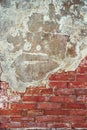 Ancient red brick wall with concrete on top half, copyspace for background Royalty Free Stock Photo