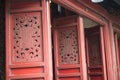 Ancient red door. Hanoi, Vietnam.