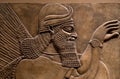 Ancient relief of an assyrian god