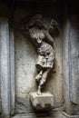 Ancient relief carving of woman on the wall of temple