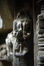 Ancient relief carving of woman on the wall of temple