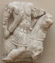 Ancient relief depicting warrior, Horse Rider with sword advancing to the right in battle scene from Balat, Turkey