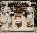 Ancient relief engravings with statues in the pavilion of the Historical Museum