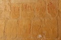 Ancient relief on the wall of the Hatshepsut temple in Thebes/Luxor in Egypt, near the valley of the kings with the image Royalty Free Stock Photo