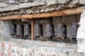 An ancient religious Buddhist prayer drums on the street.