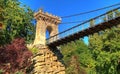 Ancient rock bridge over the lake from Romanescu Park, Craiova, Romania Royalty Free Stock Photo