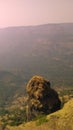 Ancient rock on the cliff top Royalty Free Stock Photo