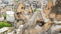 ancient rock-cut houses in Goreme town in spring Royalty Free Stock Photo