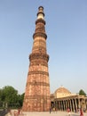 Old rock pillars and gate Delhi India and other old structure very famous around the world. millions of visitors.