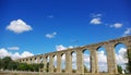 Ancient Roman aqueduct in Evora. Royalty Free Stock Photo