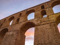 Ancient Roman architecture - brick aqueduct - low angle sunset shot