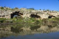 An ancient roman brick stone aqueduct structure in Ceasarea israel