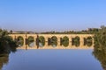 Ancient roman bridge across the Guadalquivir river in the morning