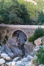 Ancient Roman bridge in a mountainous area in the Kesme Bogazi canyon, Turkey Royalty Free Stock Photo