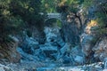 Ancient Roman bridge over a shady gorge in the Kesme Bogazi canyon, Turkey Royalty Free Stock Photo