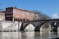 Ancient Roman bridge over the Tiber River. Rome, Italy Royalty Free Stock Photo