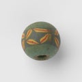 Ancient Roman glass bead with an ornamental band