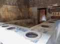 Ancient Roman kitchen in Pompeii Royalty Free Stock Photo