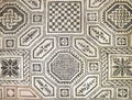 Ancient Roman mosaic floor with elaborated design in Milan, Italy Royalty Free Stock Photo