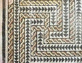 Ancient Roman mosaic floor with elaborated design in Milan, Italy Royalty Free Stock Photo