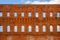 Ancient roman red brick wall with windows