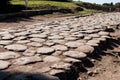 Ancient Roman road paved with stones for carriage. Decumano maxi