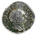 Ancient Roman silver denarius coin of Emperor Vespasian isolated on a white background