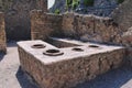 Ancient Roman snackbar in Herculaneum Italy