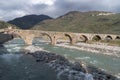 Roman stone bridge, Taggia, Liguria, Italy Royalty Free Stock Photo