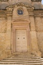 Valletta, Malta, August 2019. The main entrance to the old Catholic Church of the Order of Malta. Royalty Free Stock Photo