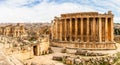 Ancient Roman temple of Bacchus panorama with surrounding ruins and city, Bekaa Valley, Baalbek, Lebanon Royalty Free Stock Photo