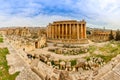 Ancient Roman temple of Bacchus panorama with surrounding ruins of ancient city, Bekaa Valley, Baalbek, Lebanon Royalty Free Stock Photo