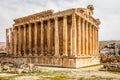 Ancient Roman temple of Bacchus with surrounding ruins of ancient city, Bekaa Valley, Baalbek, Lebanon Royalty Free Stock Photo