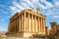 Ancient Roman temple of Bacchus with surrounding ruins with blue sky in the background, Bekaa Valley, Baalbek, Lebanon Royalty Free Stock Photo