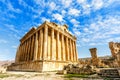 Ancient Roman temple of Bacchus with surrounding ruins with blue sky in the background, Bekaa Valley, Baalbek, Lebanon Royalty Free Stock Photo