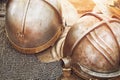 Ancient Roman vintage soldier helmet, armor to protect the head in battle. Reconstruction of military events during the wars of