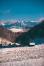 Ancient romanian houses on the frozen hills in the middle of winter