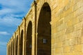 Ancient Ruin with Arch and Old Wall