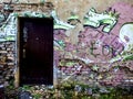 Ancient and ruined front wall of one house