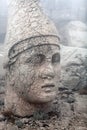 Ancient ruined statue on the top of Nemrut mount, Turkey Royalty Free Stock Photo