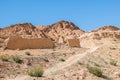 An ancient ruined stone wall in desert Royalty Free Stock Photo