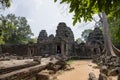 Ancient ruins of Banteay Kdei temple in Angkor Wat complex, Cambodia. Demolished temple view. Old stone temple ruin.