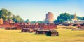 Ancient ruins and buddhist stupa Dharmarajika Dhamek Stupa in Sarnath Royalty Free Stock Photo