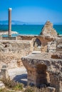 Ancient ruins at Carthage, Tunisia with the Mediterranean Sea in Royalty Free Stock Photo