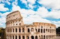 Ancient ruins Colosseum Rome, Italy, background blue sky with clouds Royalty Free Stock Photo
