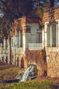 Ancient ruins with columns and waterfall Royalty Free Stock Photo