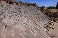 Ancient ruins of the Greek-Roman amphitheater at the ancient city of Myra in Demre, Turkey Royalty Free Stock Photo